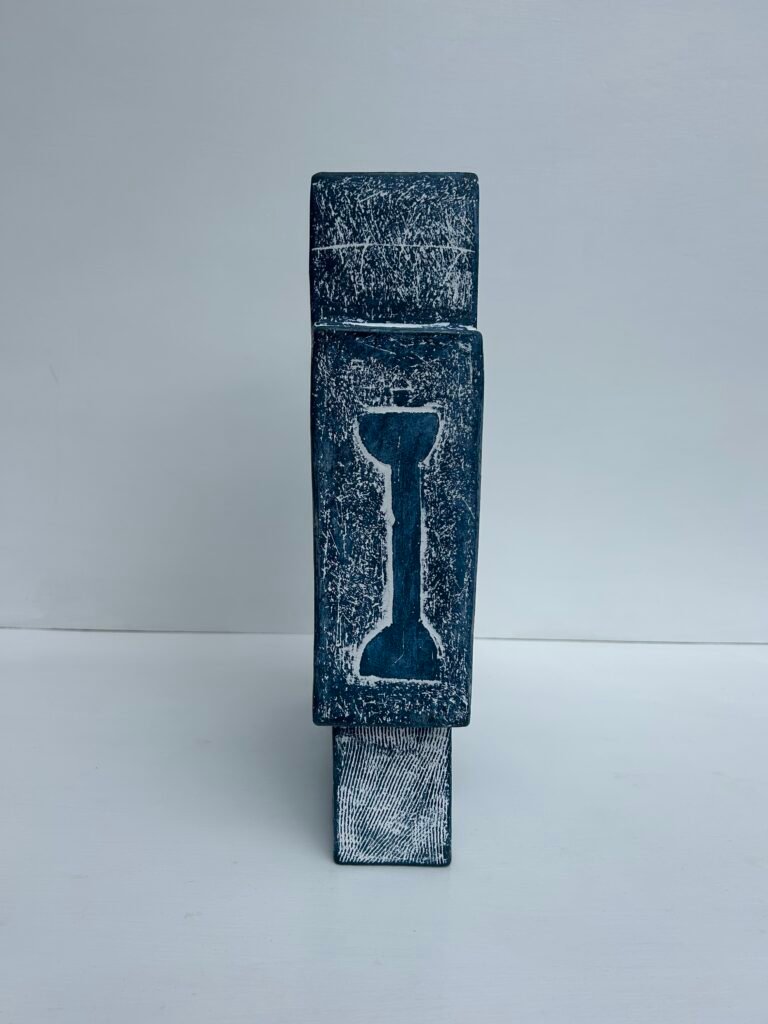 Available homeward journey, side view of ceramic sculpture